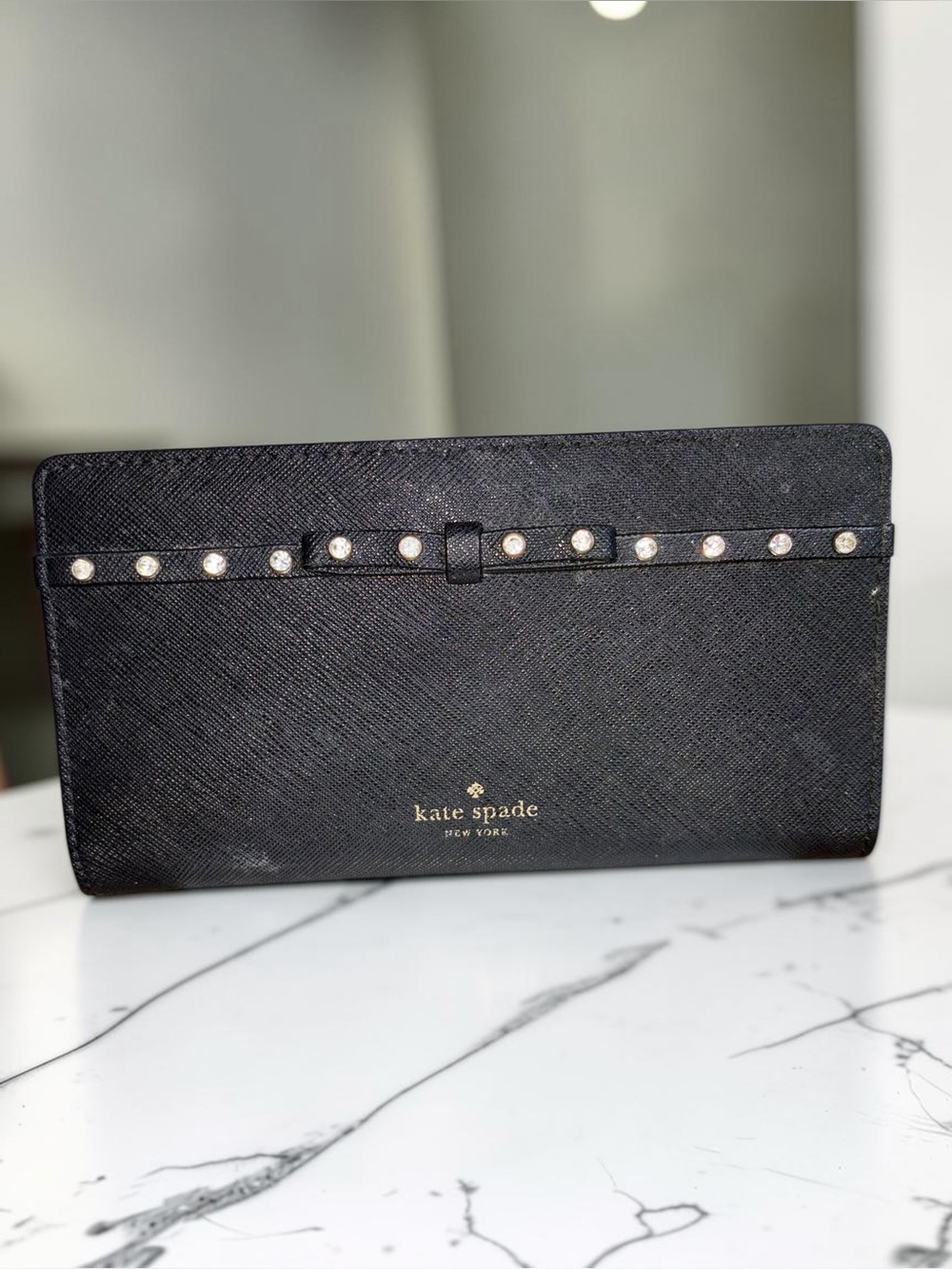 kate spade Black Saffiano Leather wallet with gem -Stud Bow Trim